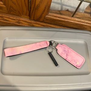 Chapstick holder with safety whistle